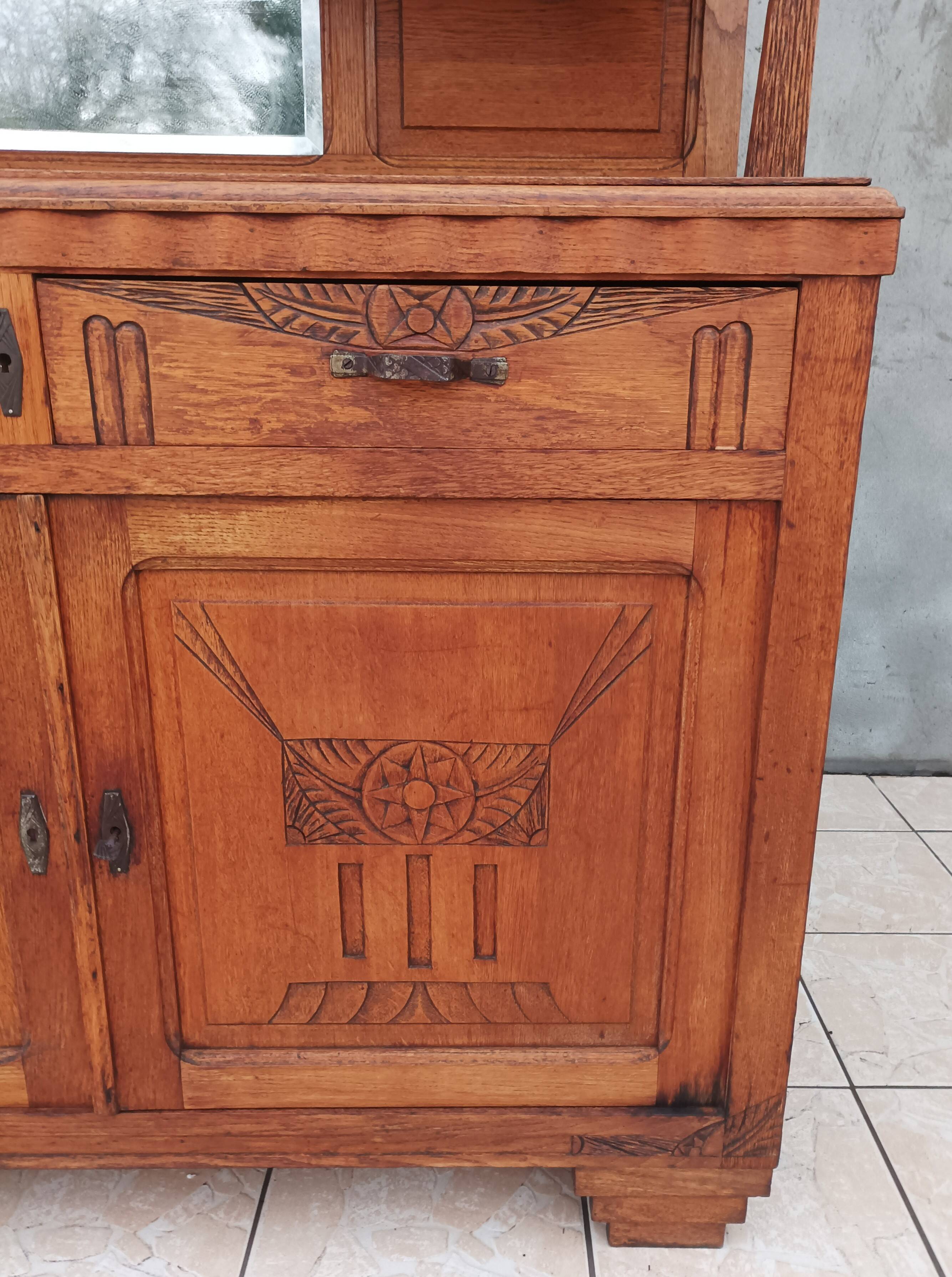 Art Deco period carved oak sideboard