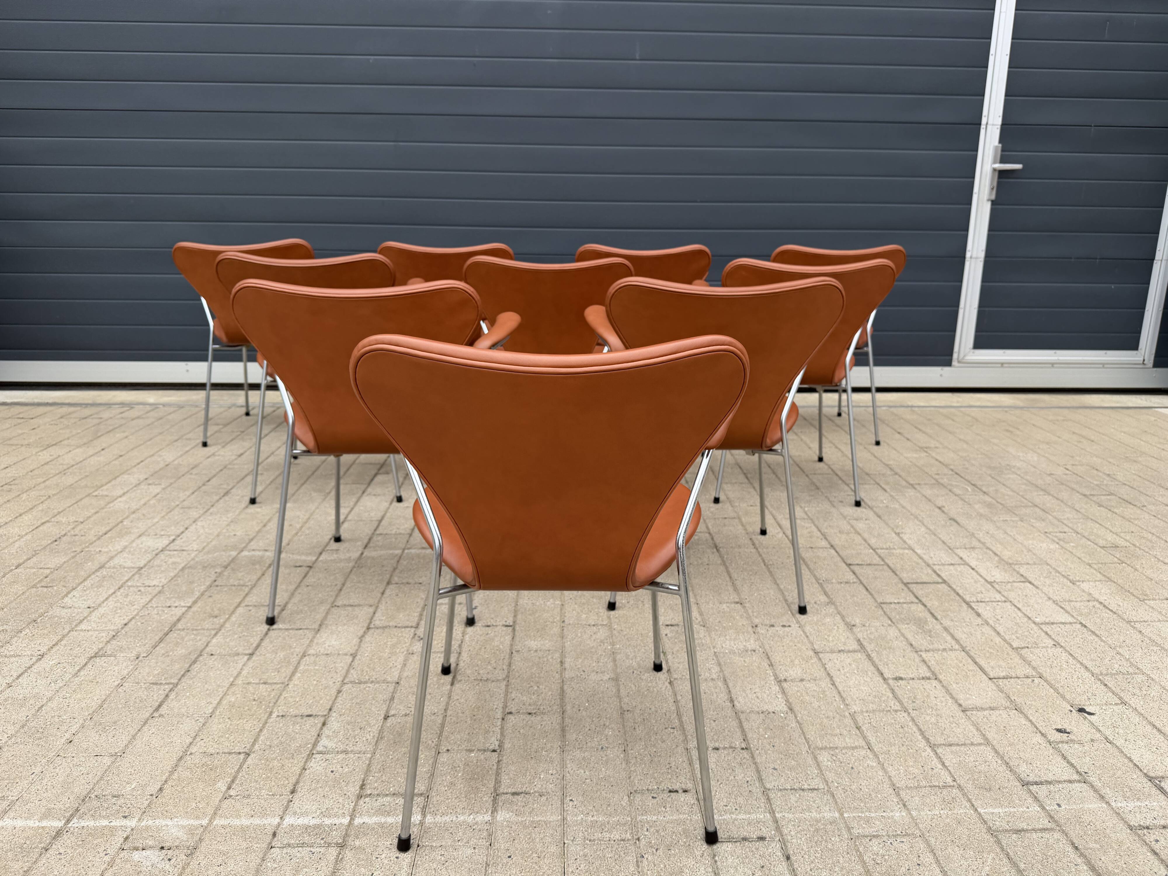 10x armchairs with arms, series 7 Butterfly Fritz Hansen by Arne Jacobsen in Cognac leather, in perfect condition.