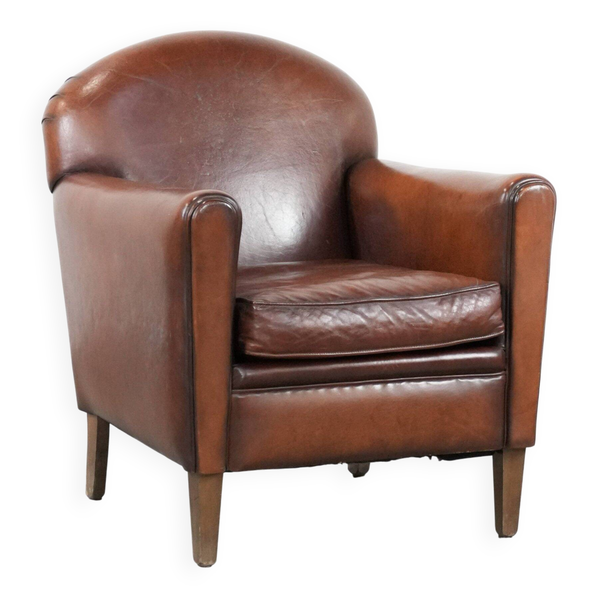 Armchair made of sheepskin leather in art deco design with warm colours