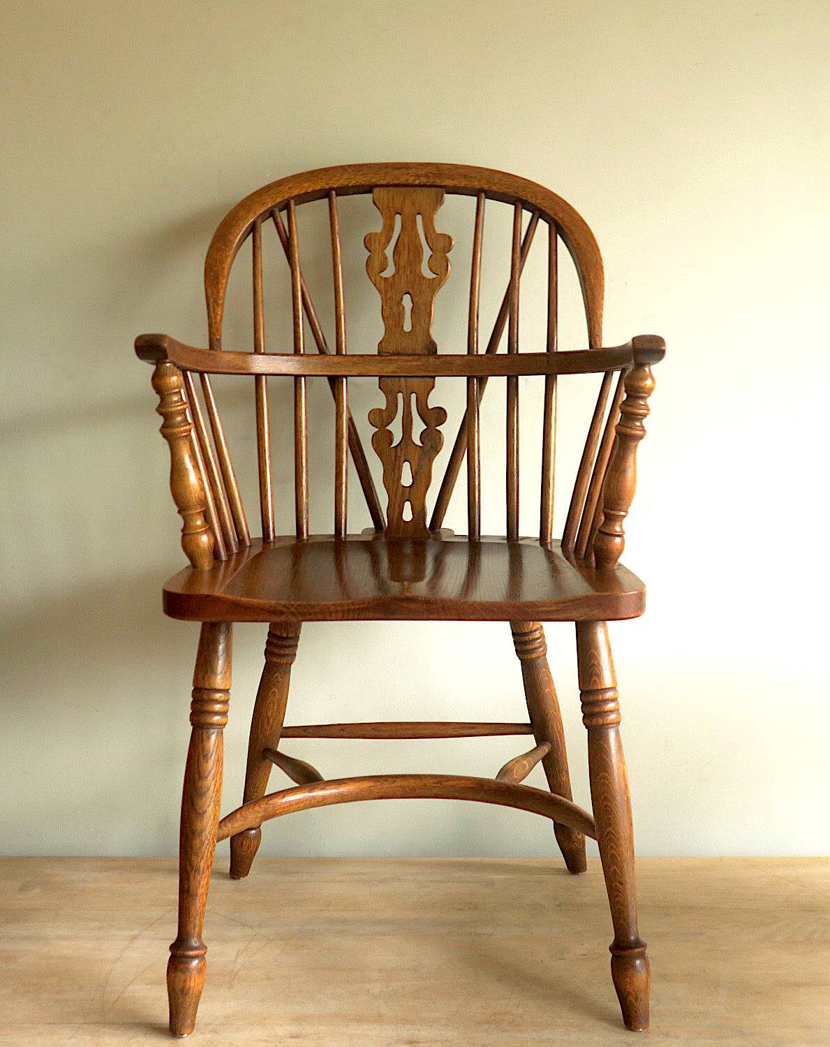 Mid century solid oak lyre-back Windsor elbow armchair, 1960s