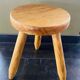 Pair of wooden tripod stools