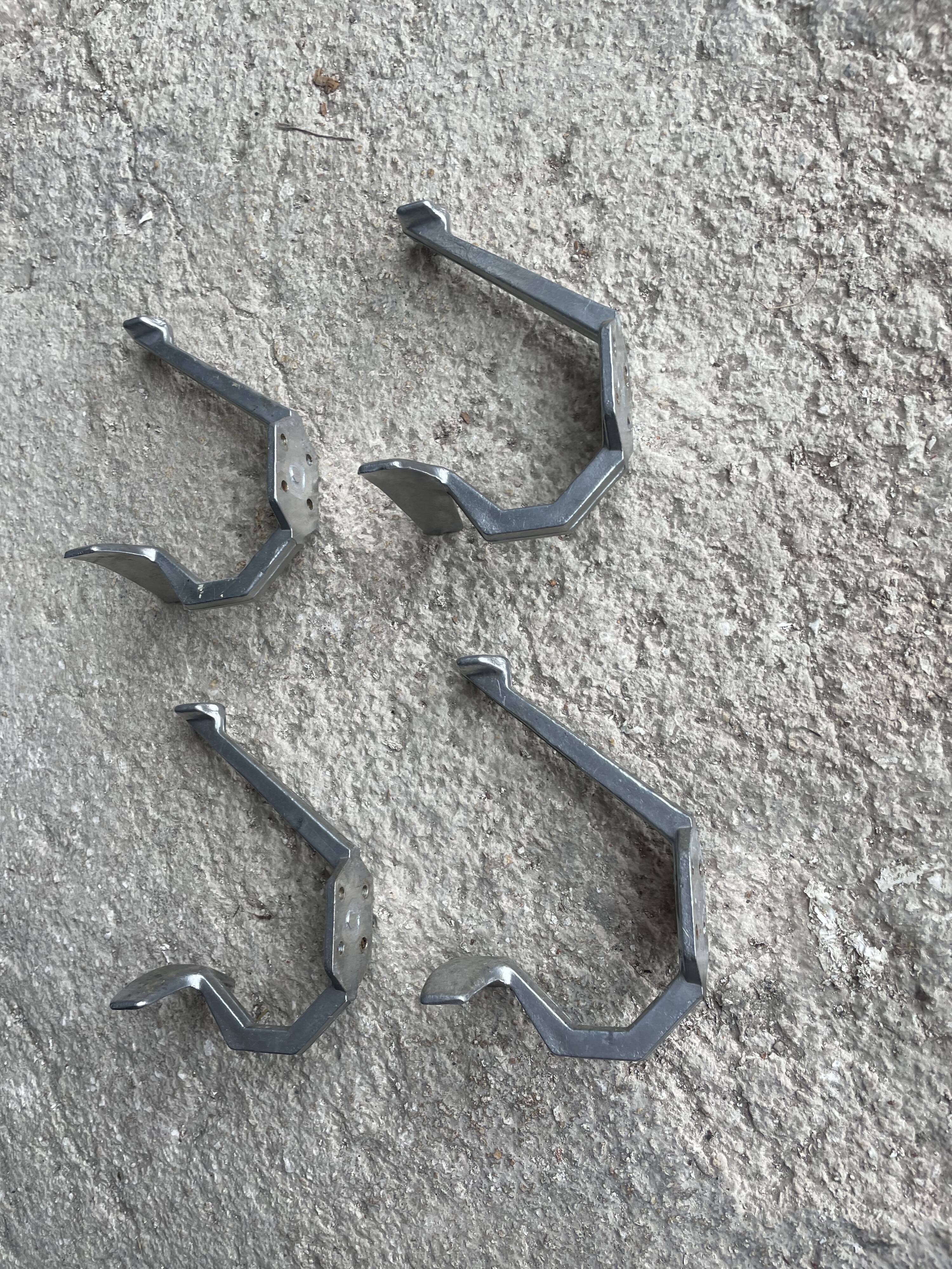 Set of 4 old metal coat hooks