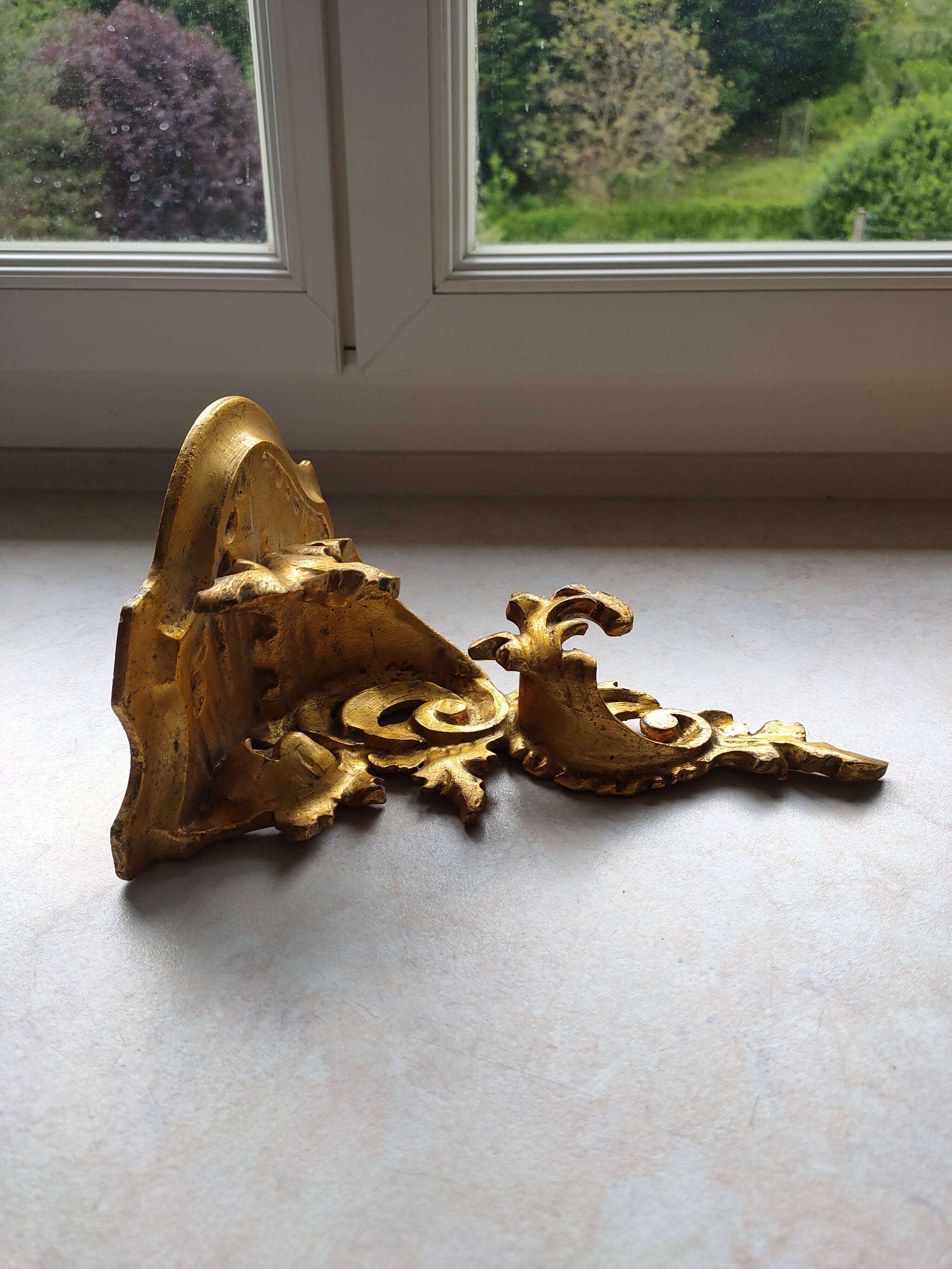 Baroque style golden shelf.