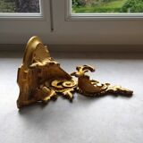 Baroque style golden shelf.