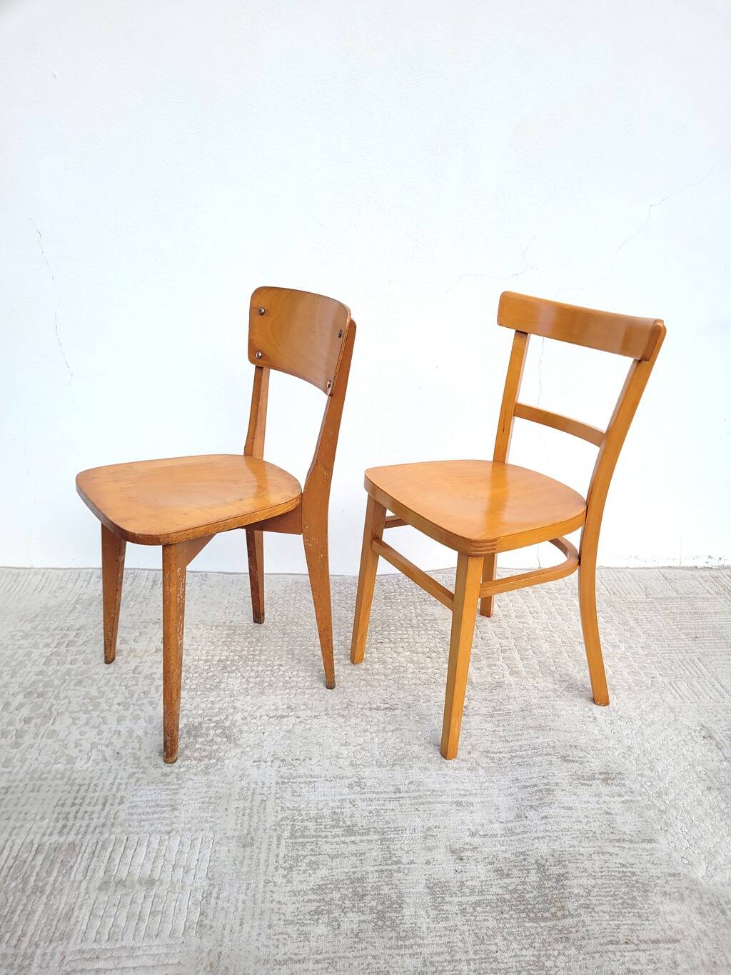 Pair of bistro chairs, one Thonet.