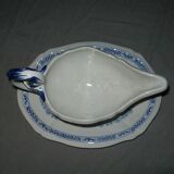 Saucière in Gien earthenware anse in the shape of a dolphin decoration garland 1900