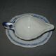 Saucière in Gien earthenware anse in the shape of a dolphin decoration garland 1900