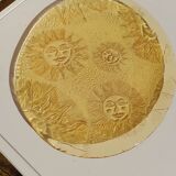Glass plate decorated with suns, 1980.