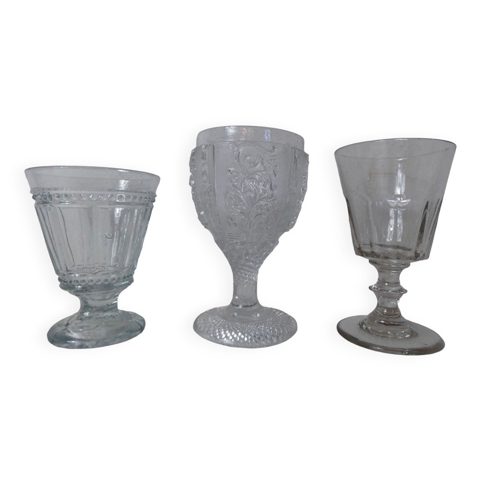 3 old stemmed glasses