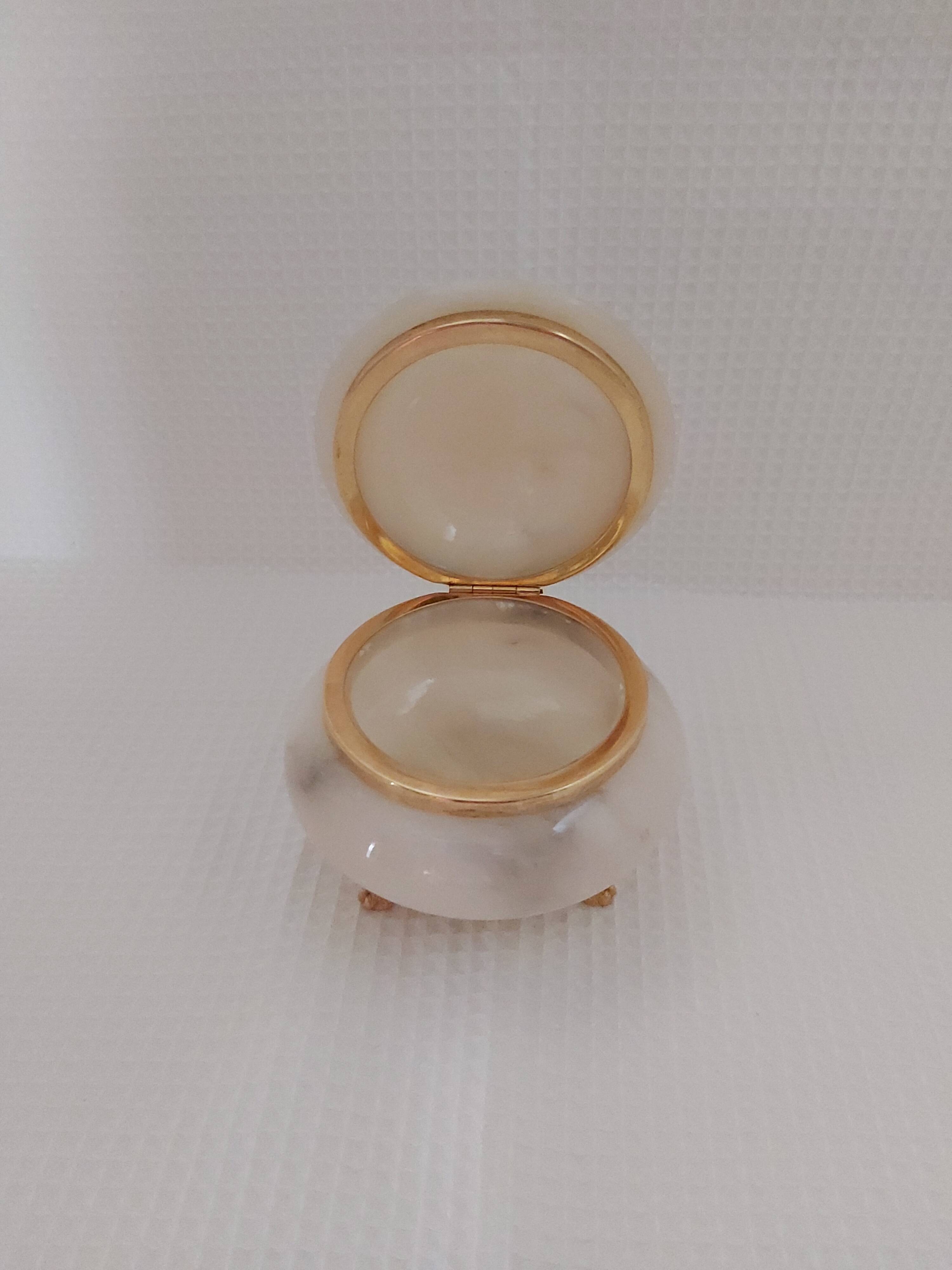 Ivory-colored alabaster box on feet
