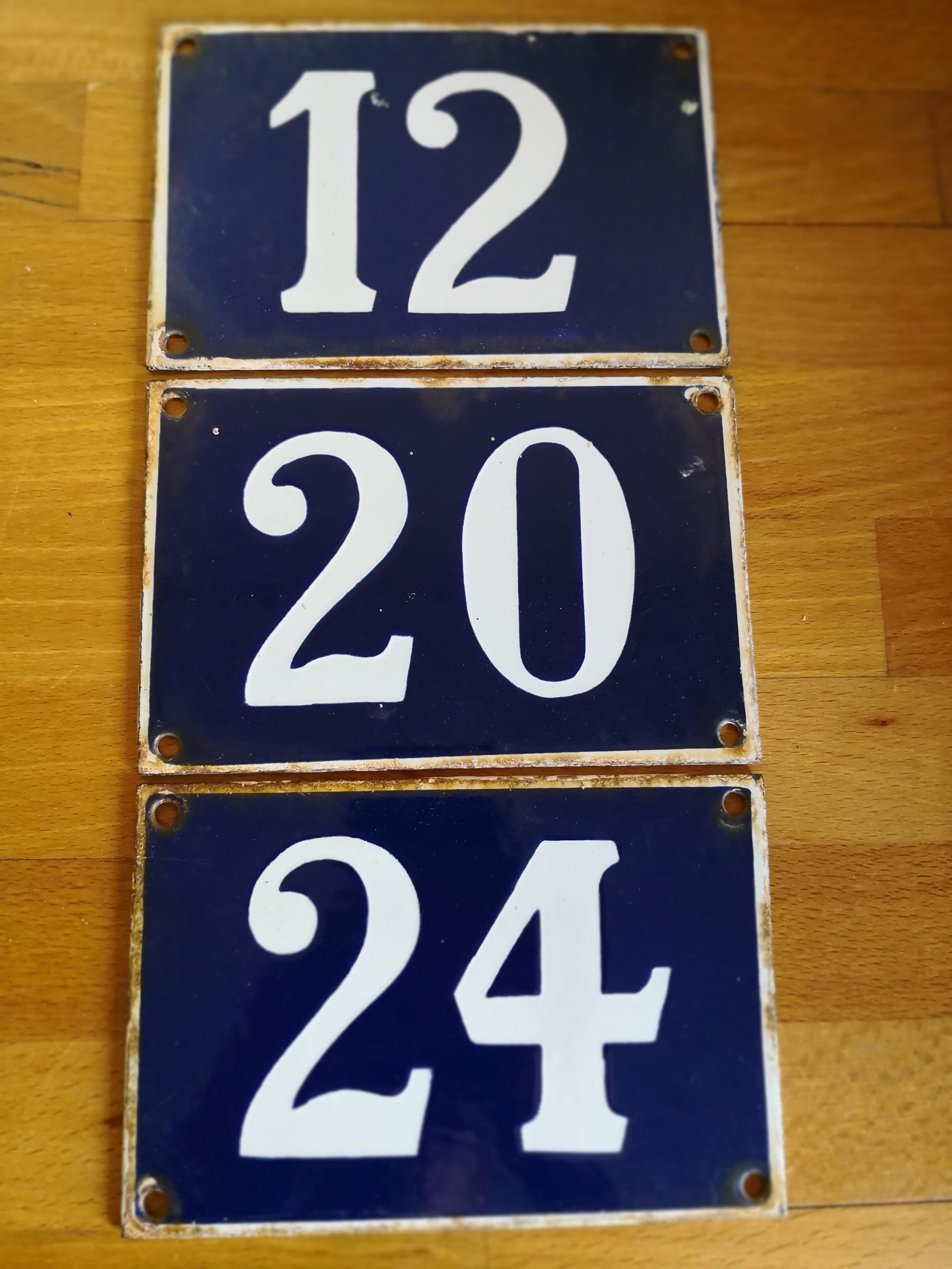 Old enameled plate number of street