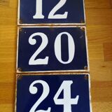 Old enameled plate number of street