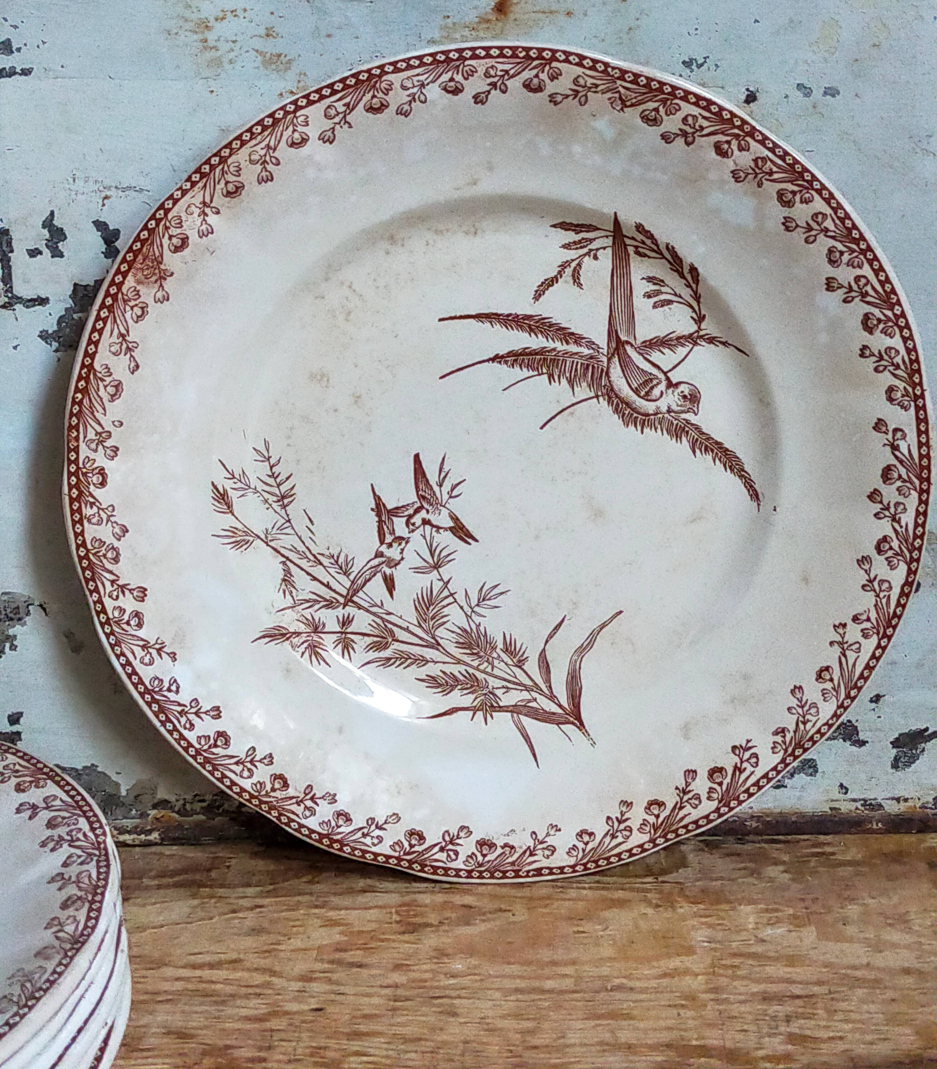 Seven iron earth dessert plates with birds ffPexonne late 19th century