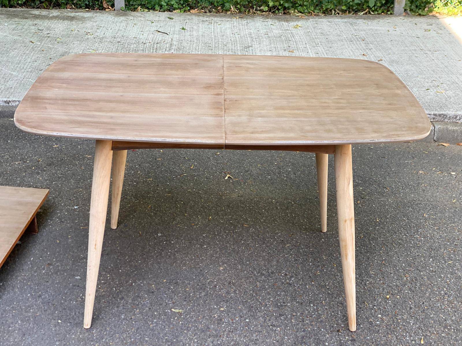 Renovated Scandinavian extendable dining table in teak and veneer from 1980.