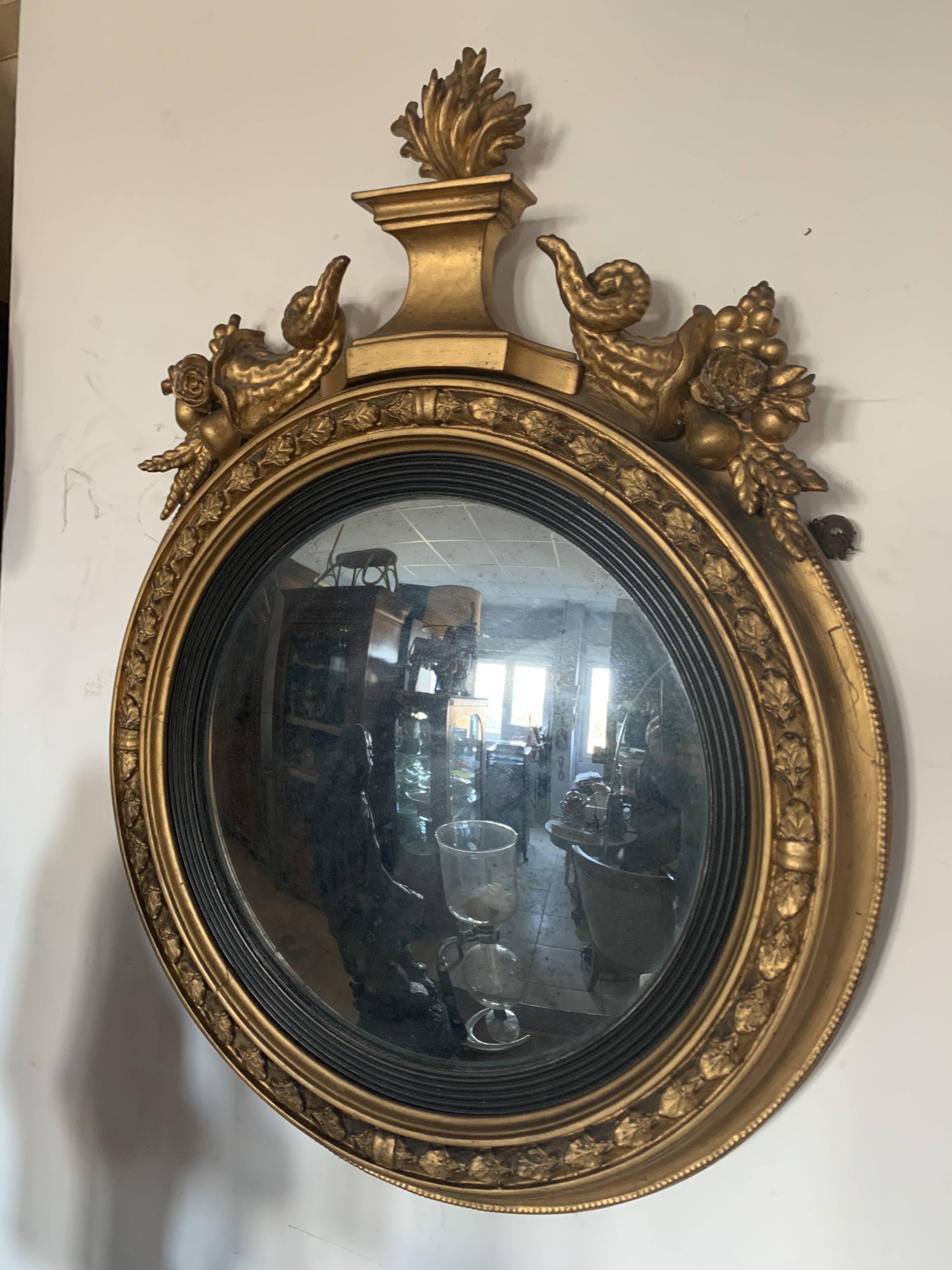 Miroir sorcière en bois sculpté doré XIX siècle