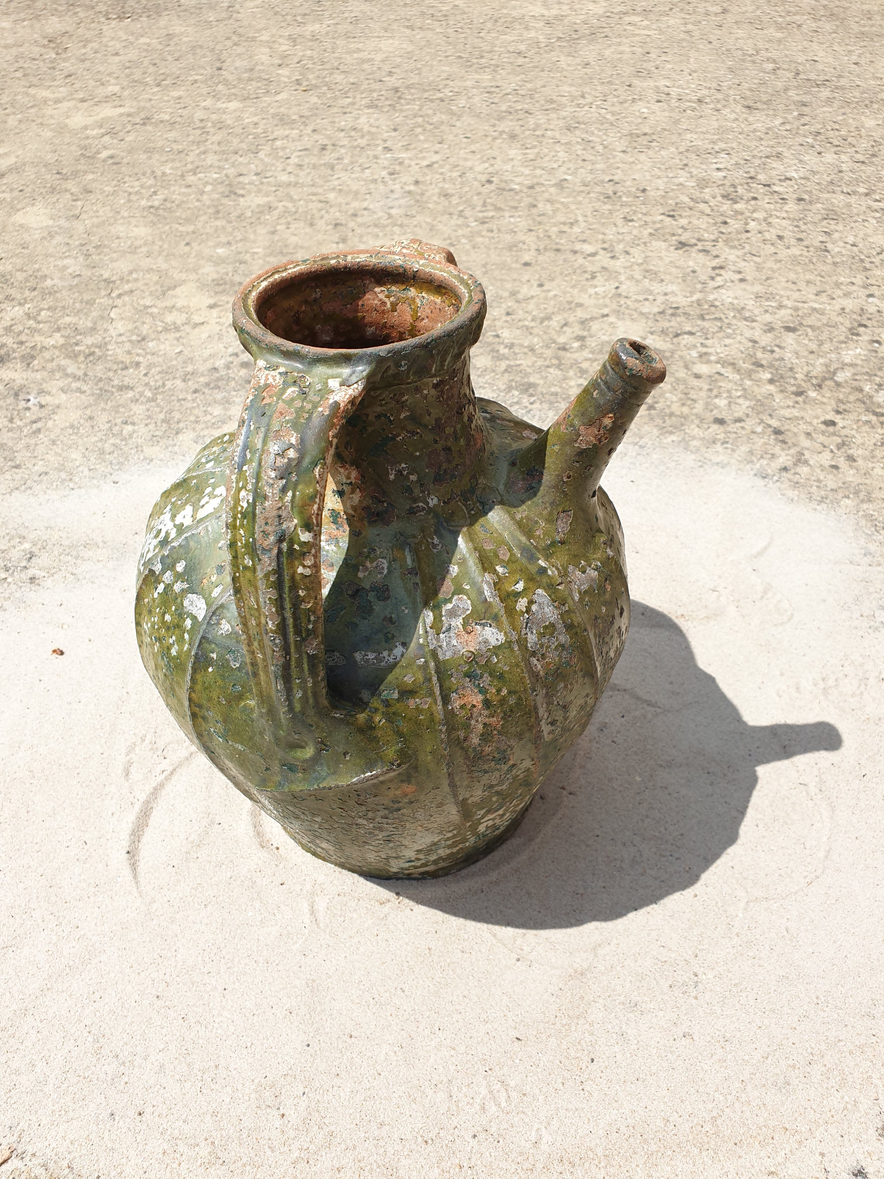 Dig jug pottery vase ancient terracotta green