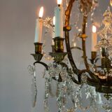 Bronze cage chandelier adorned with cut crystal pendants, 12 lights
