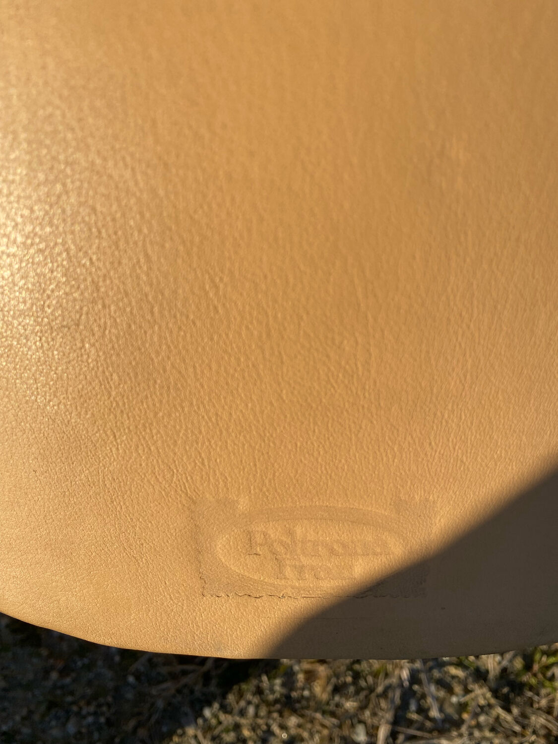 Pair of designer leather armchairs