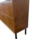 Vintage wooden sideboard with black steel legs.