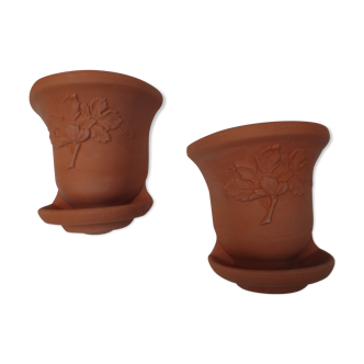 Duet of old flowerpots earthen terracotta