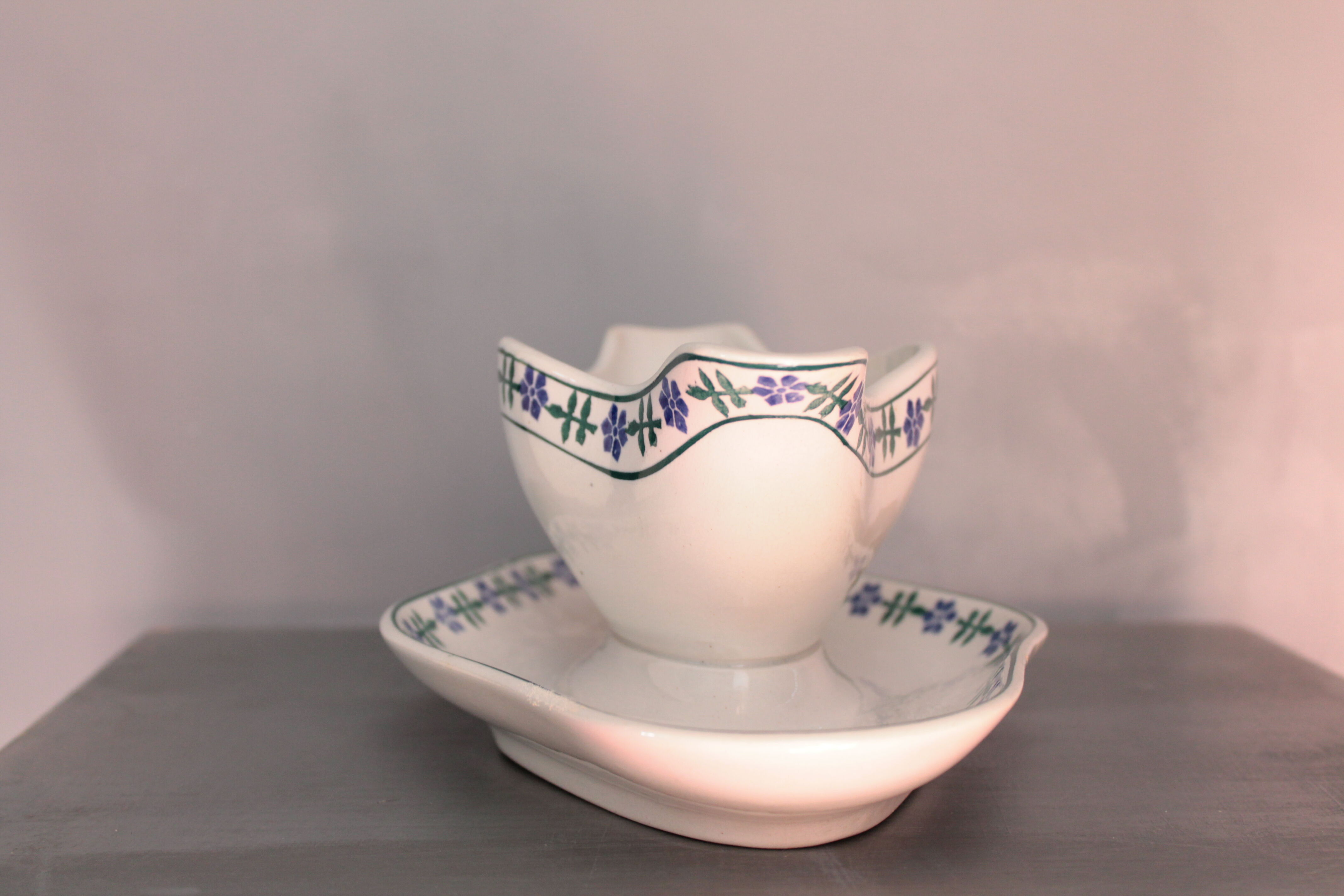 Old French white and blue gravy boat, in opaque porcelain, with blue flower pattern