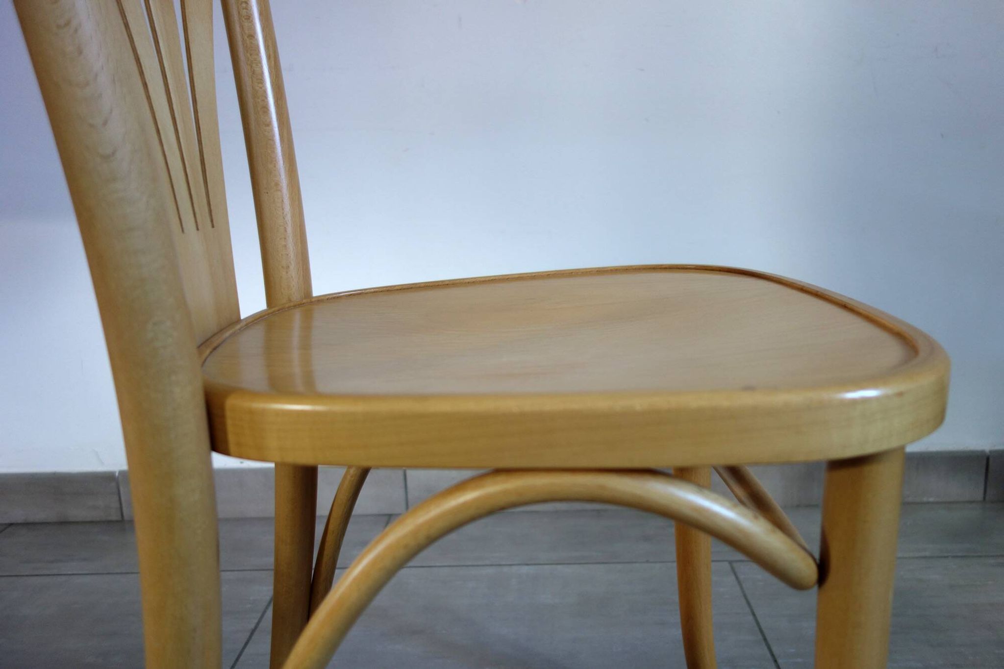 Pair of Thonet-inspired bistro chairs in light beech