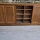 Oak workshop furniture with sliding doors.