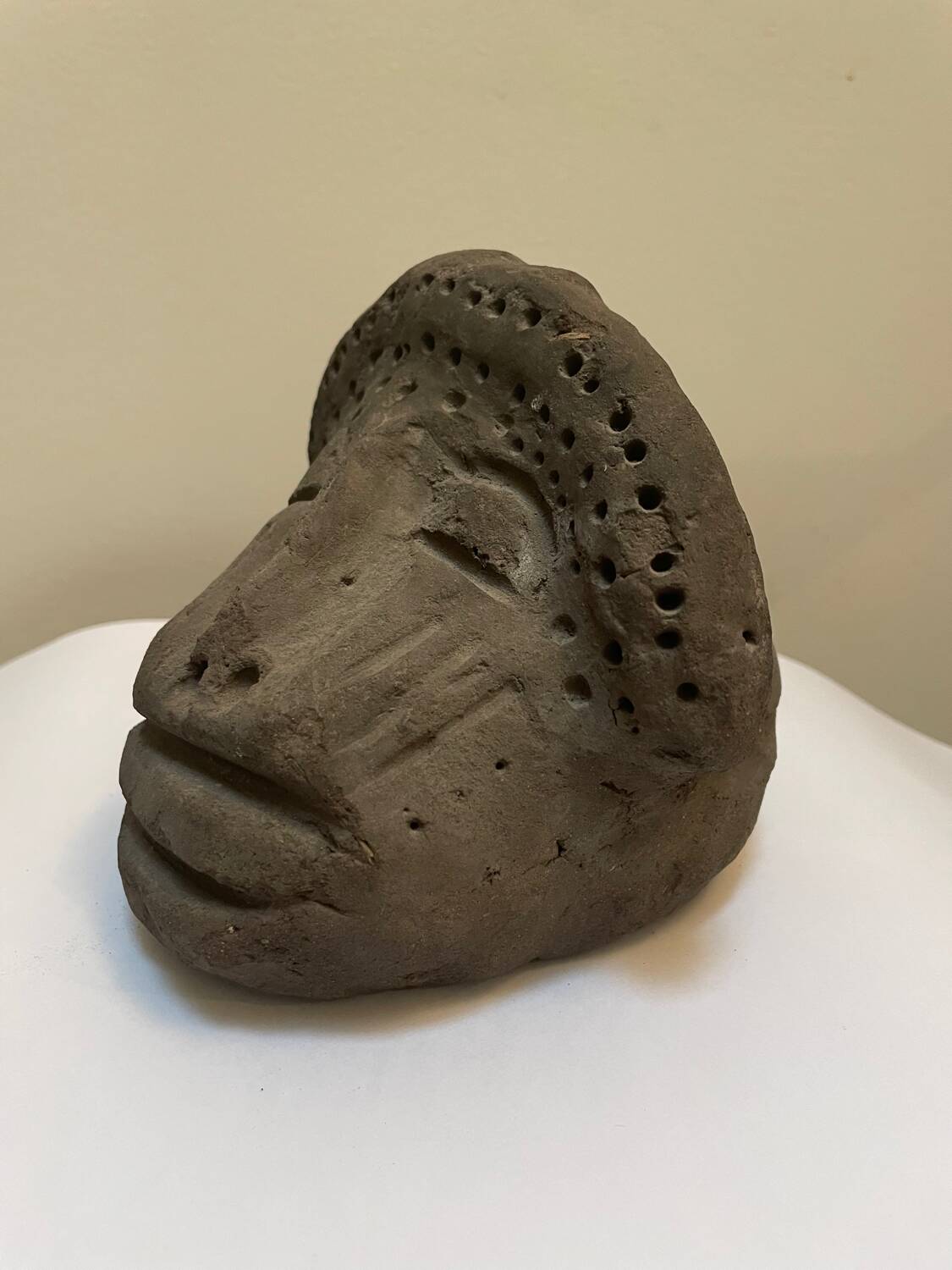 Primitive art head sculpture