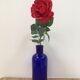 Large blue pharmaceutical vial