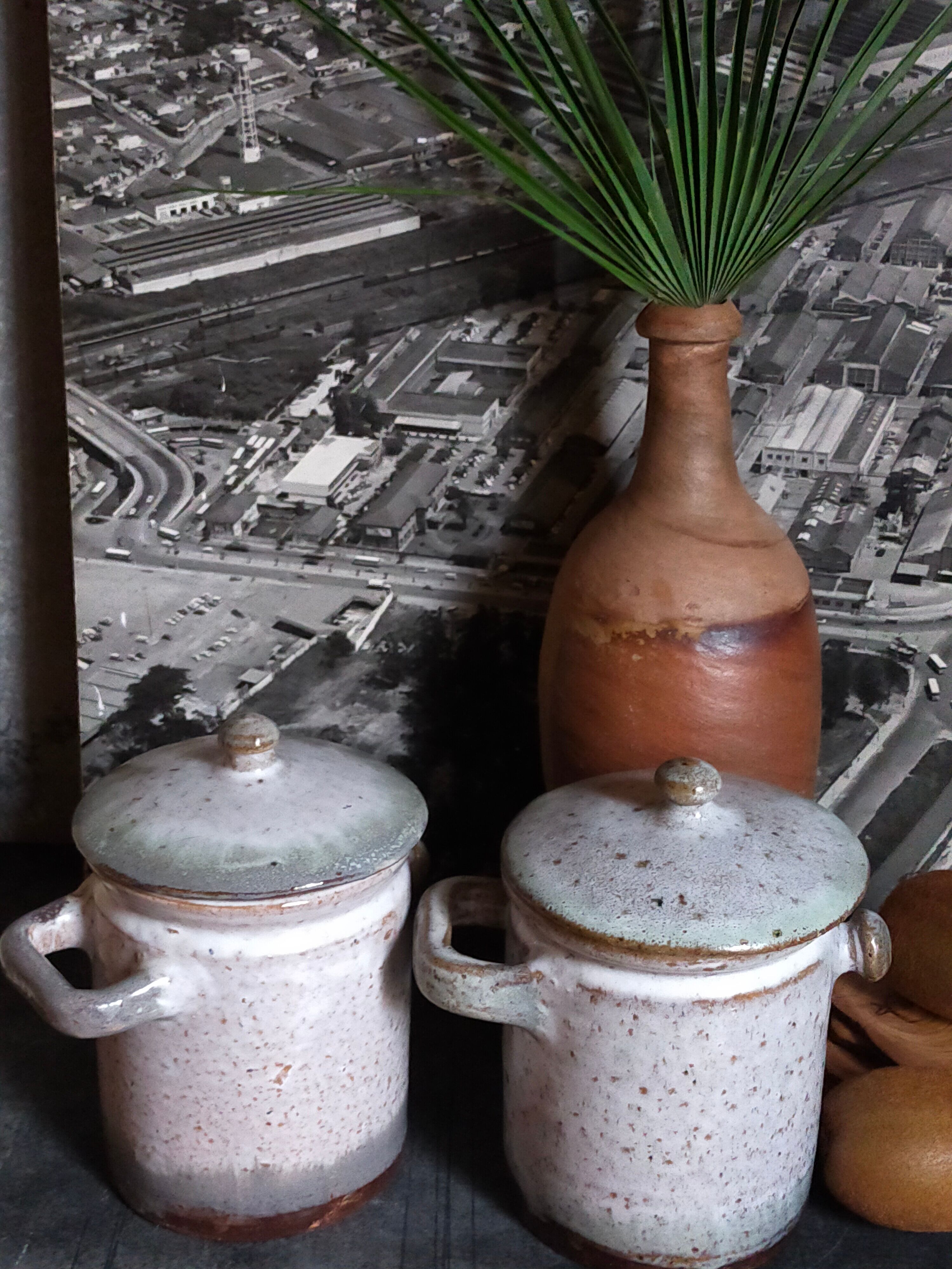 Duo of potter's pots covered in vintage glazed stoneware