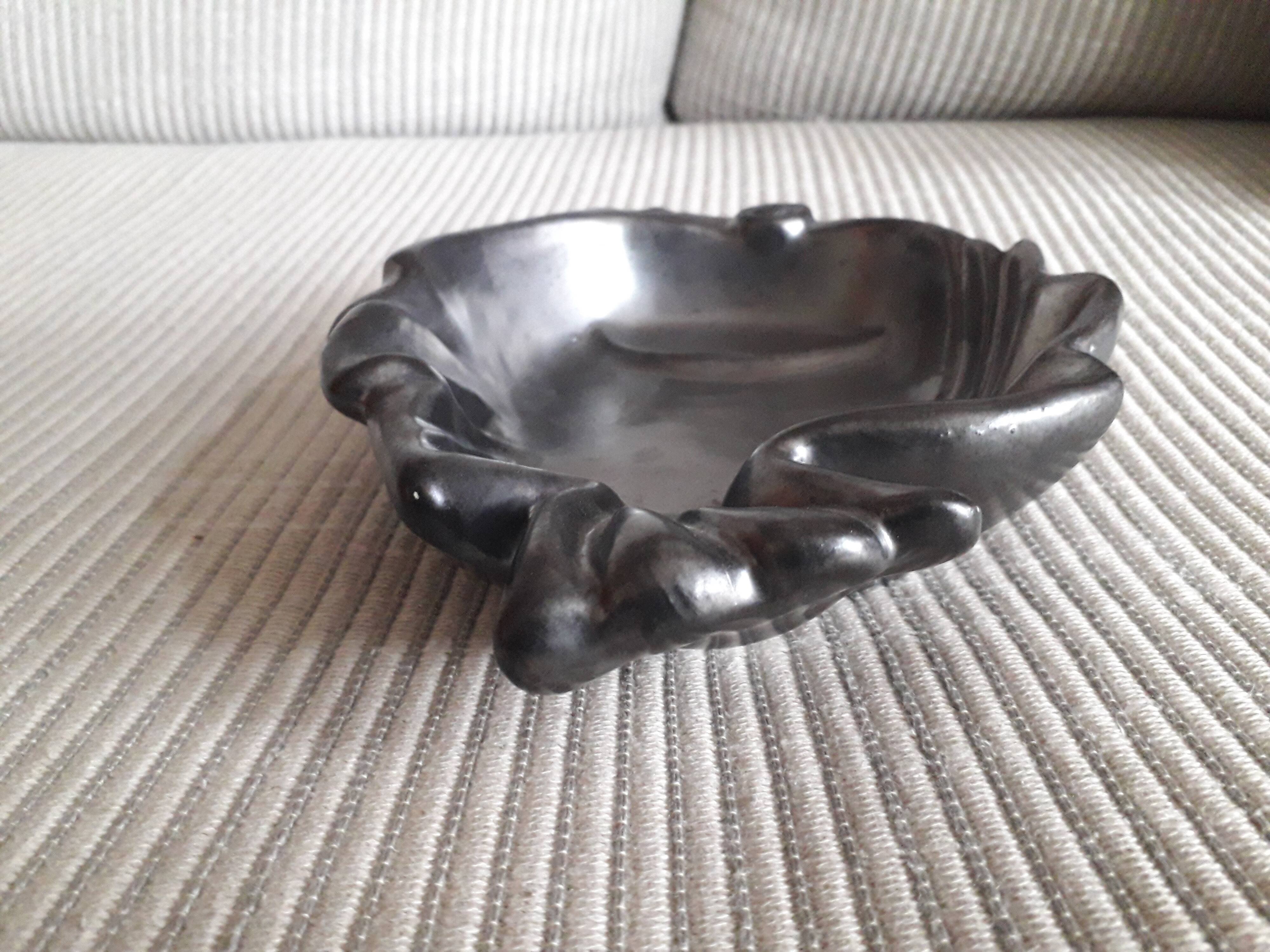 Vallauris fish-shaped pocket emptier