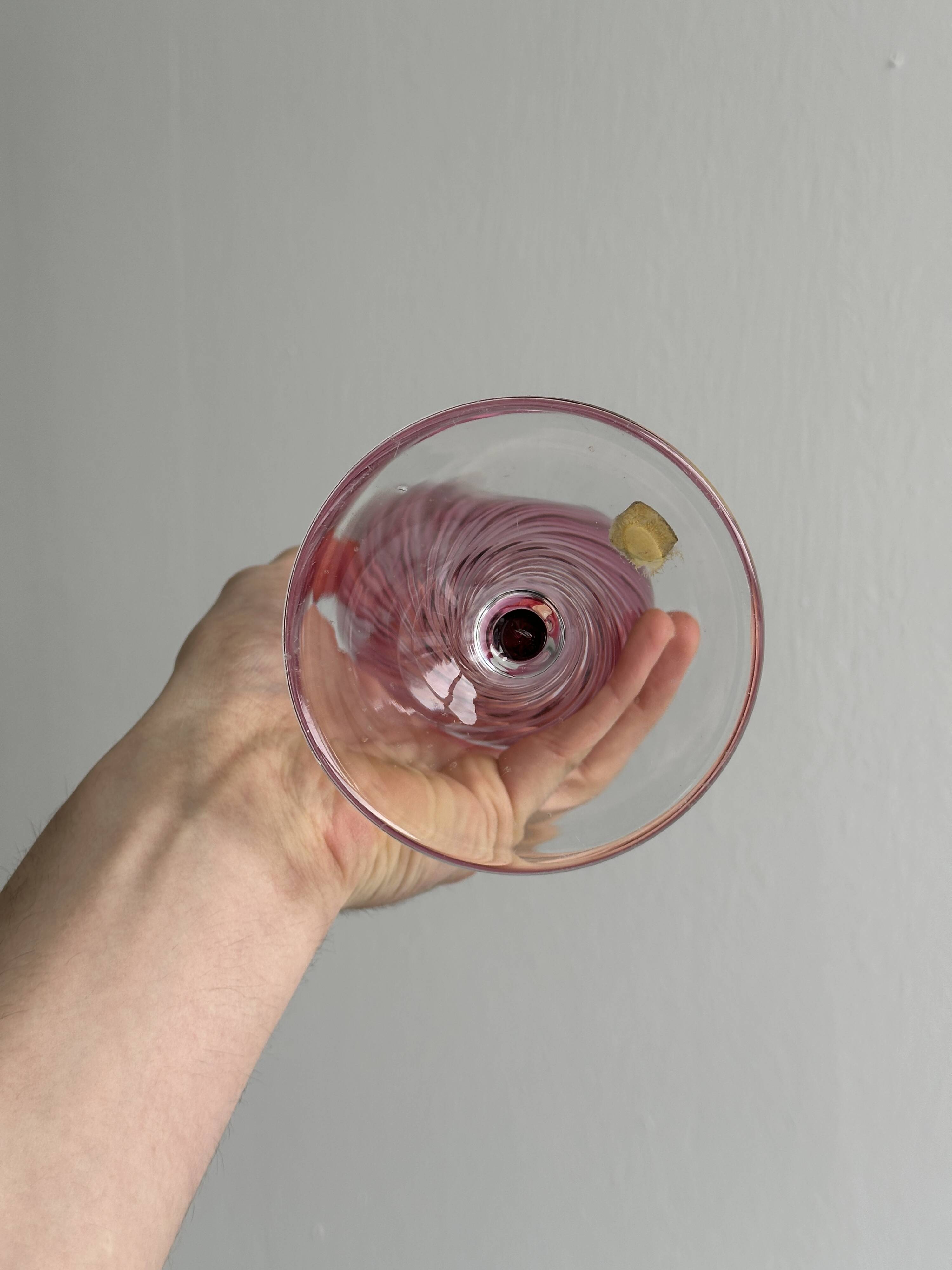 Twisted pink blown glass vase