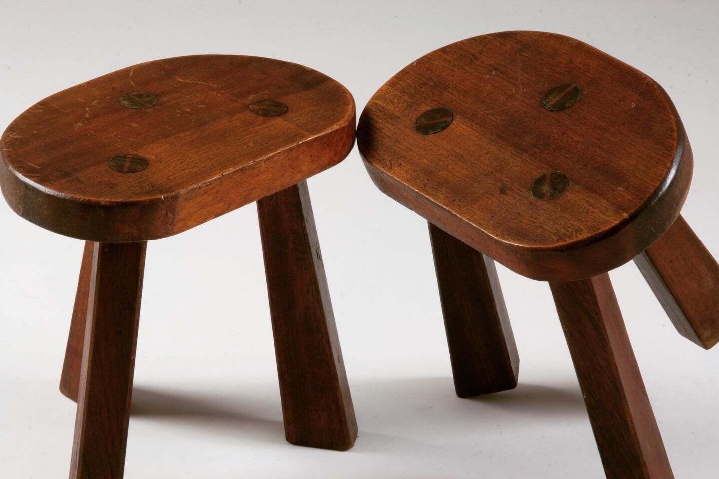 Pair of tripod brutalist stools, France 1950s