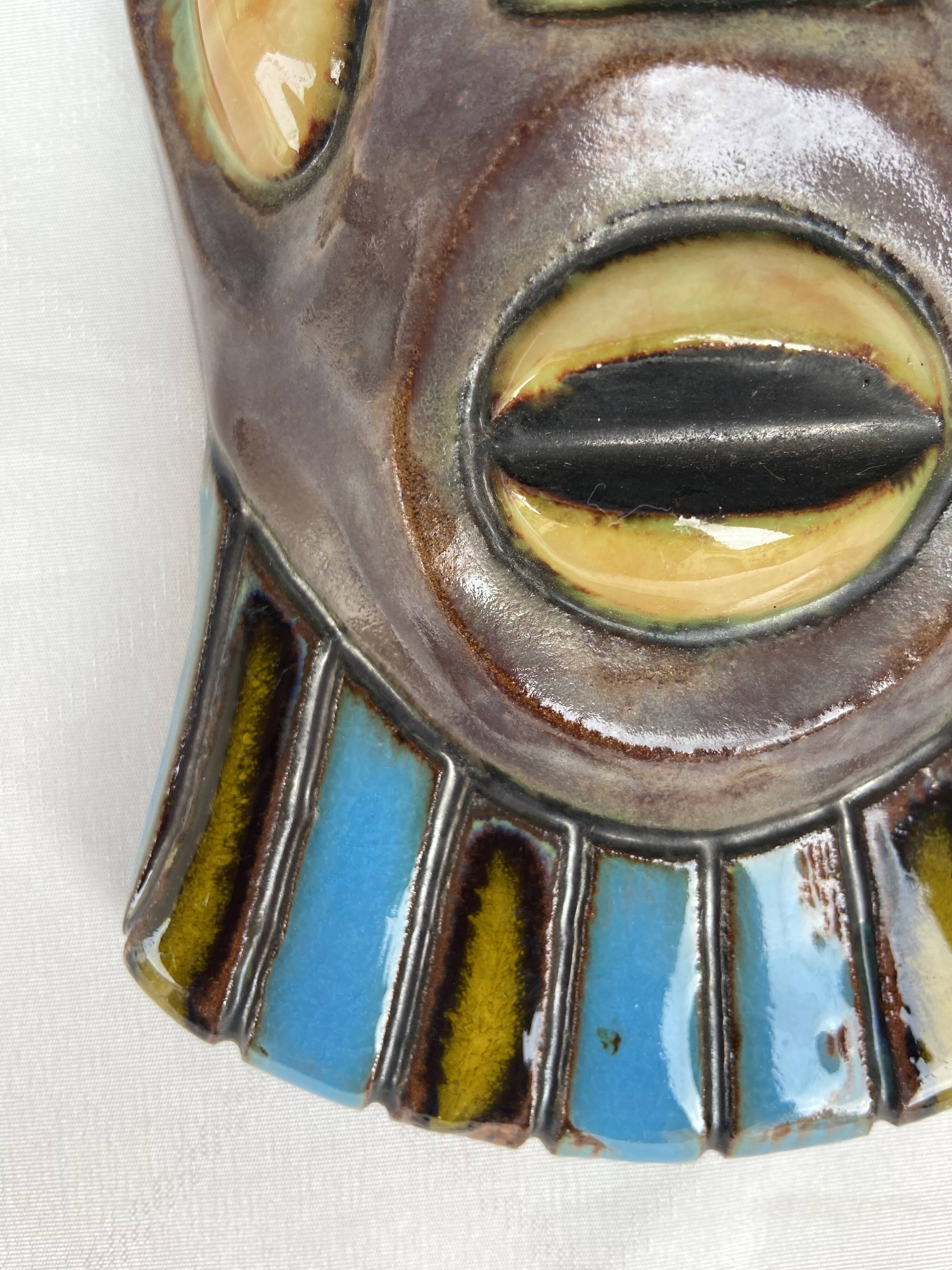 Masque africain en céramique