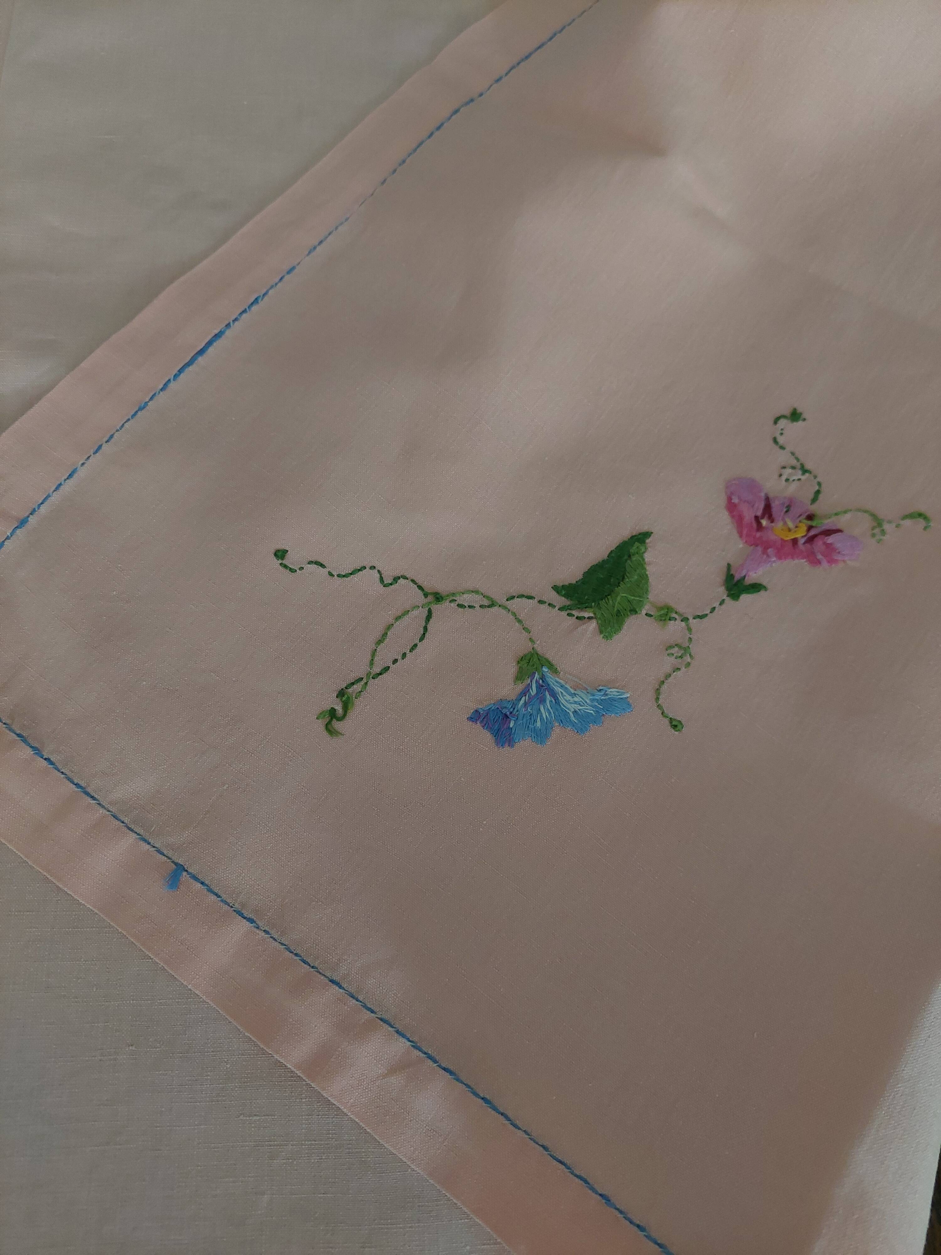 Antique pink cotton tablecloth with embroidered multicolored flowers