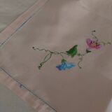 Antique pink cotton tablecloth with embroidered multicolored flowers