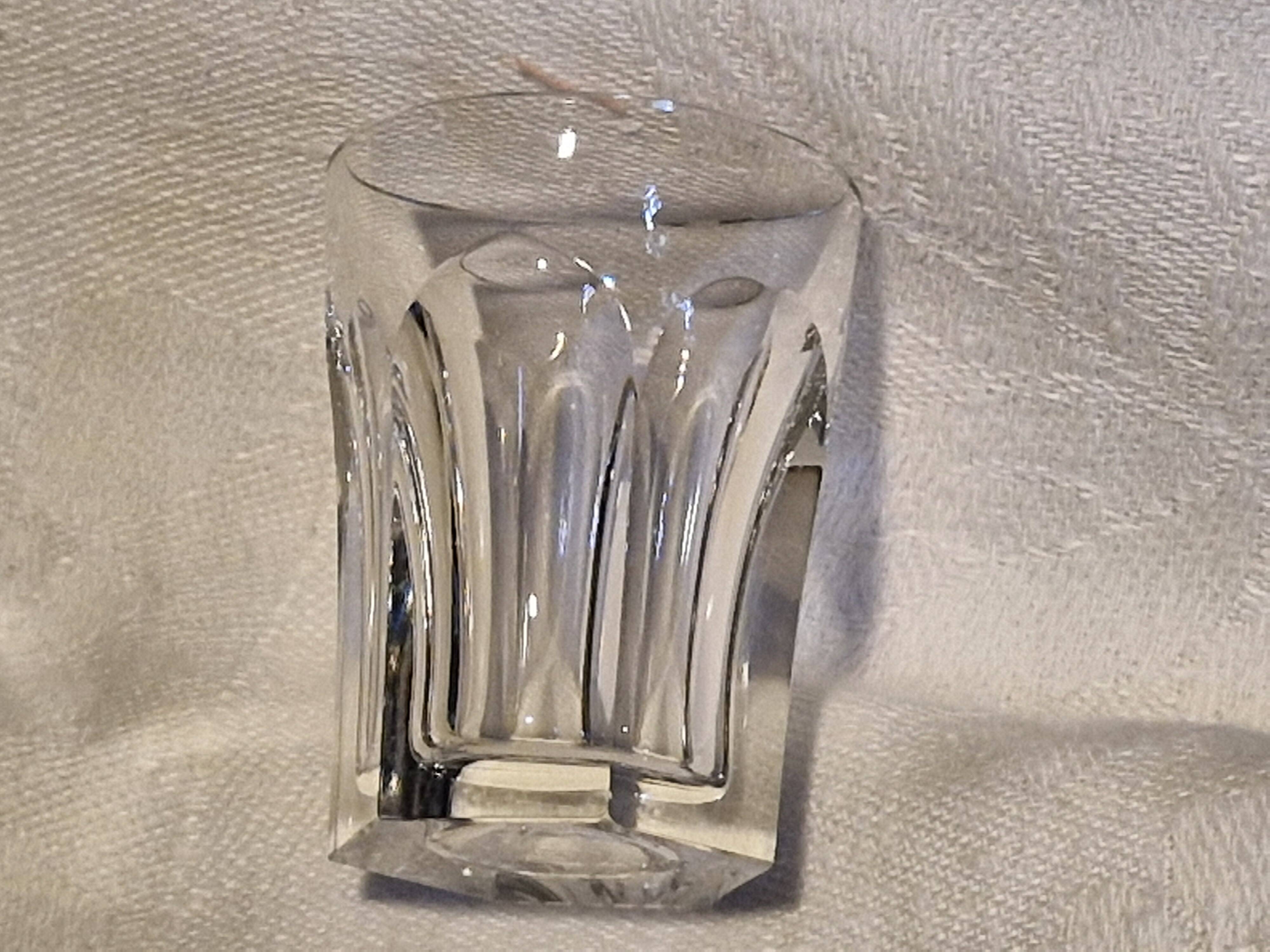 Baccarat 7 crystal liqueur glasses signed Model Harcourt on a stand.