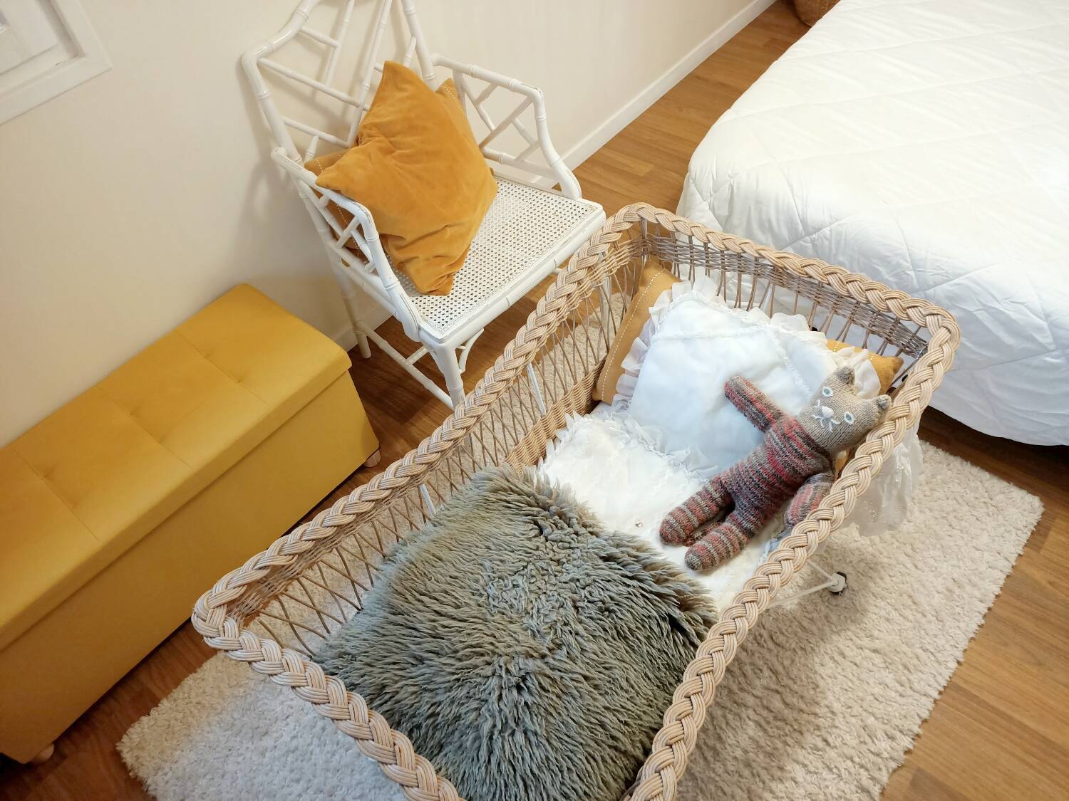 Rattan and wrought iron cradle