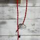 Suspension opaline plissée cordon rouge