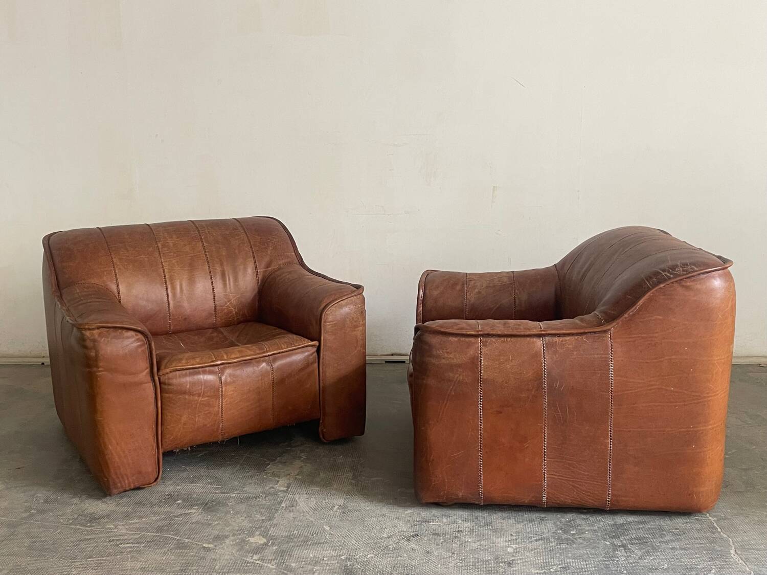 Pair of leather armchairs