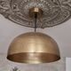 Hammered gold pendant light
