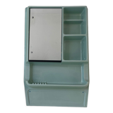 Baby blue plastic mirror and wash station