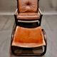 Fauteuil et son ottoman rotin et cuir 1950