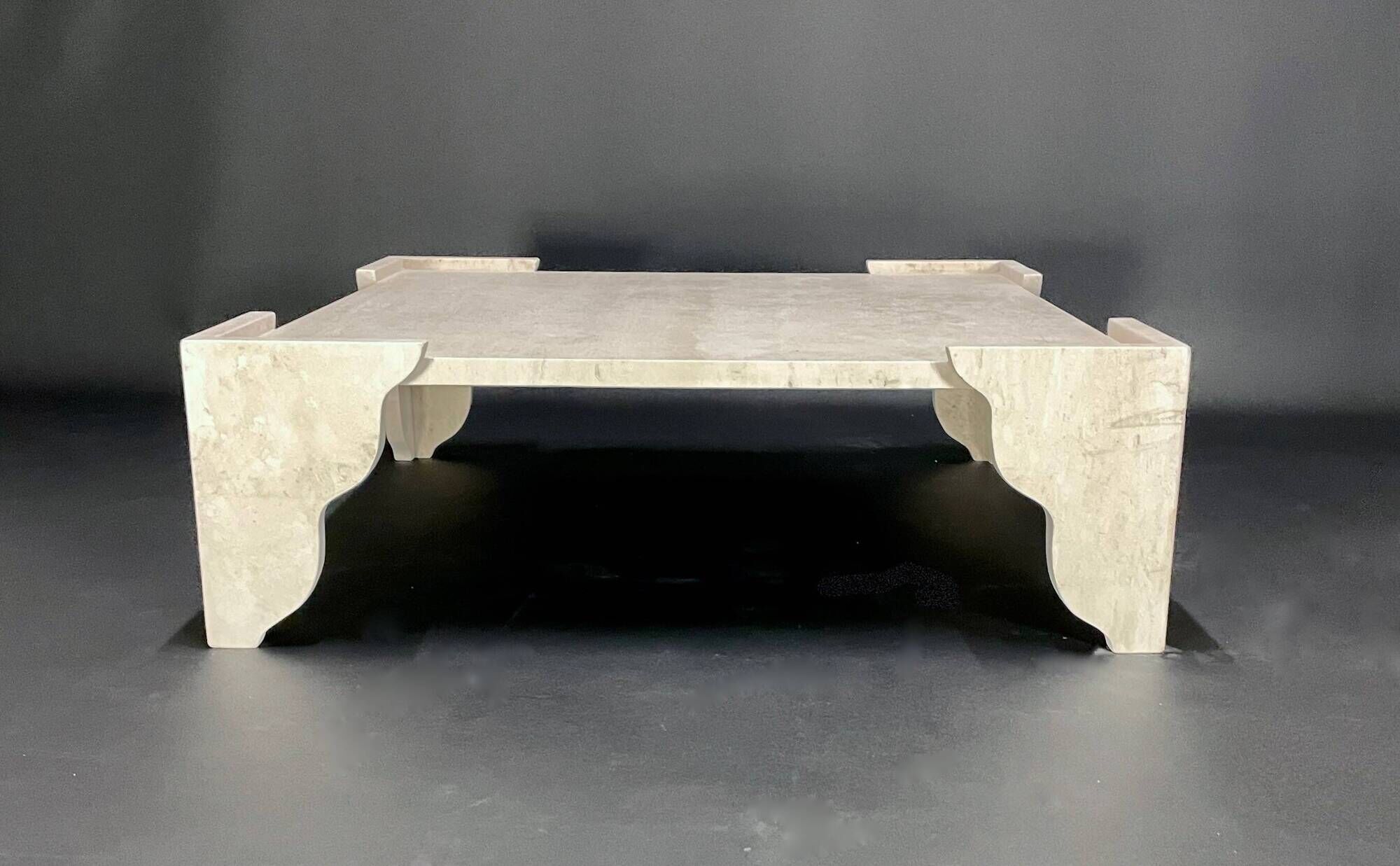 Large square coffee table in travertine by Claude Berraldacci. 1990s. France.