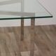 Table basse minimaliste en acier chromé et verre