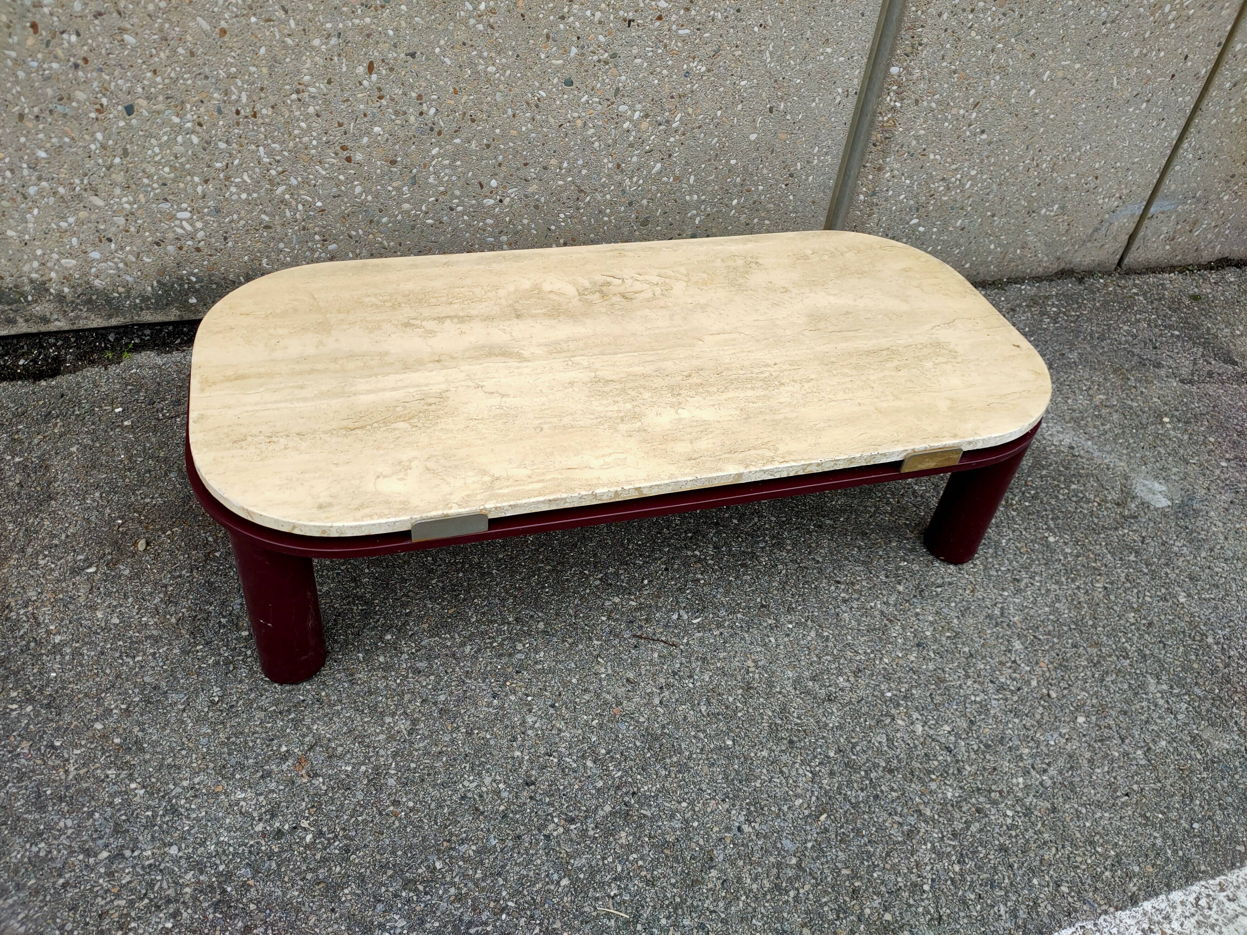 Coffee table Travertine top, garnet-colored metal stand and legs.  Long
