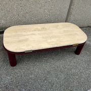 Coffee table Travertine top, garnet-colored metal stand and legs.  Long