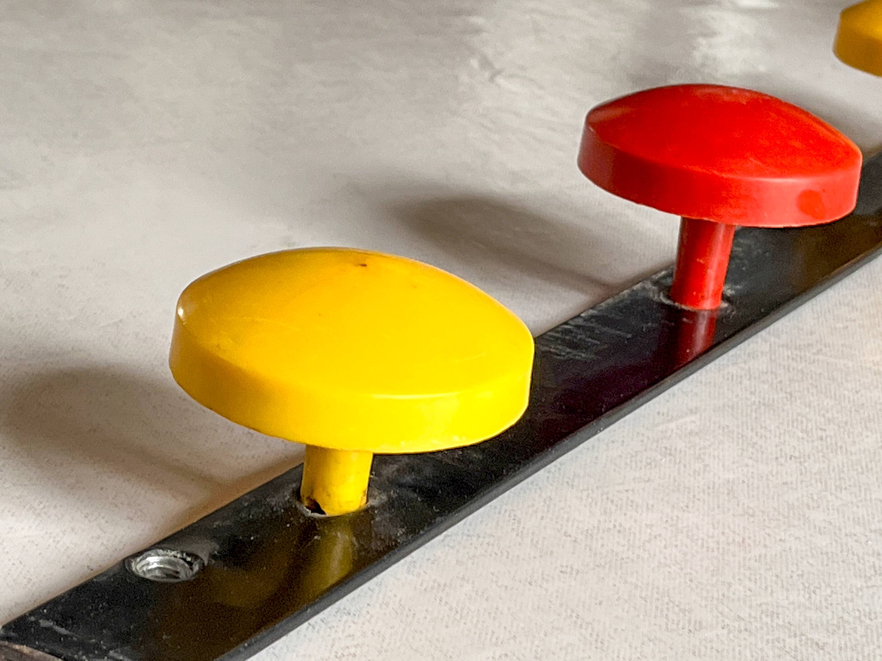 Vintage metal coat rack with colourful plastic hooks, 1960s.