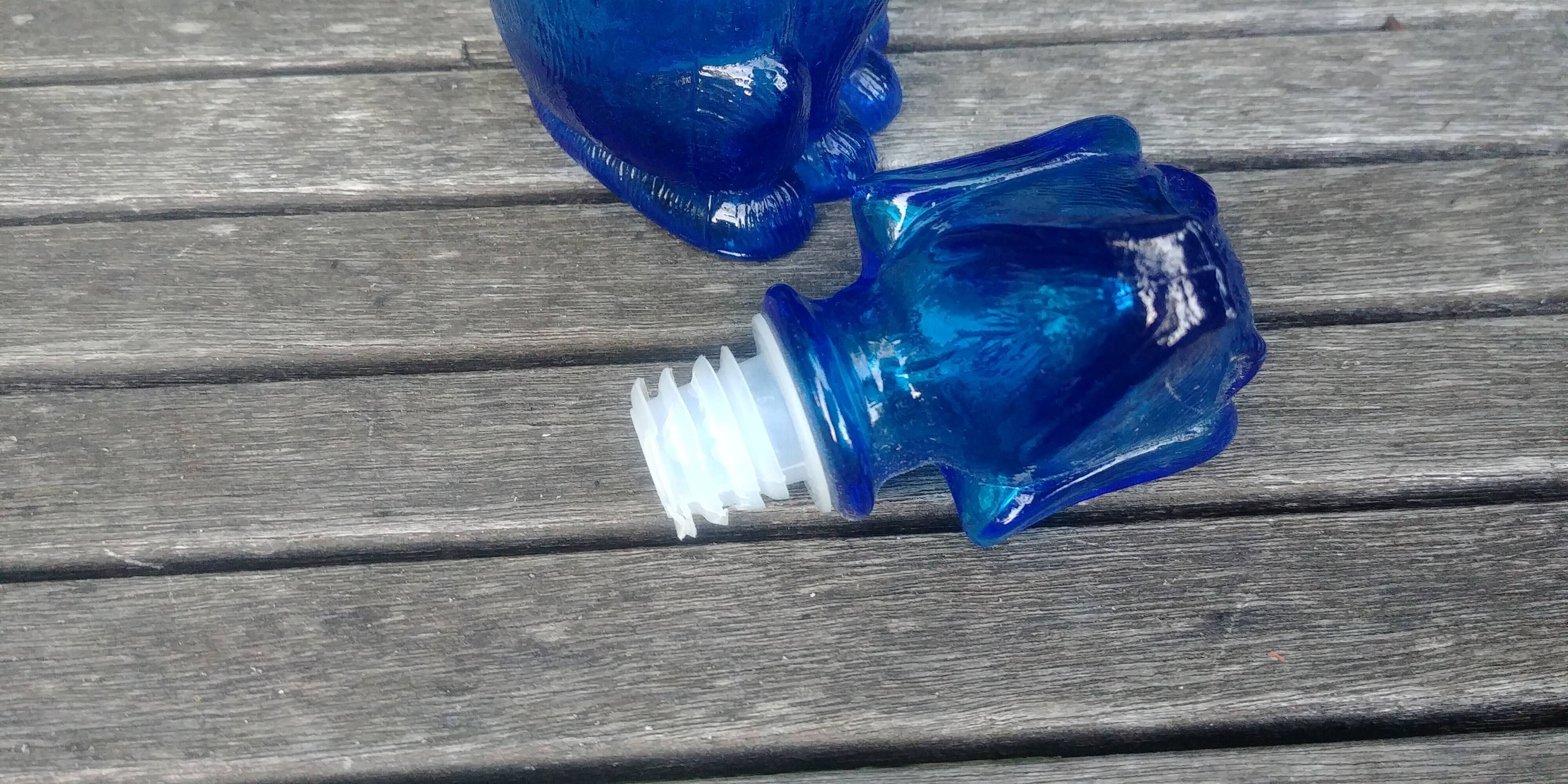Carafe in the shape of a dog in vintage Empoli blue glass