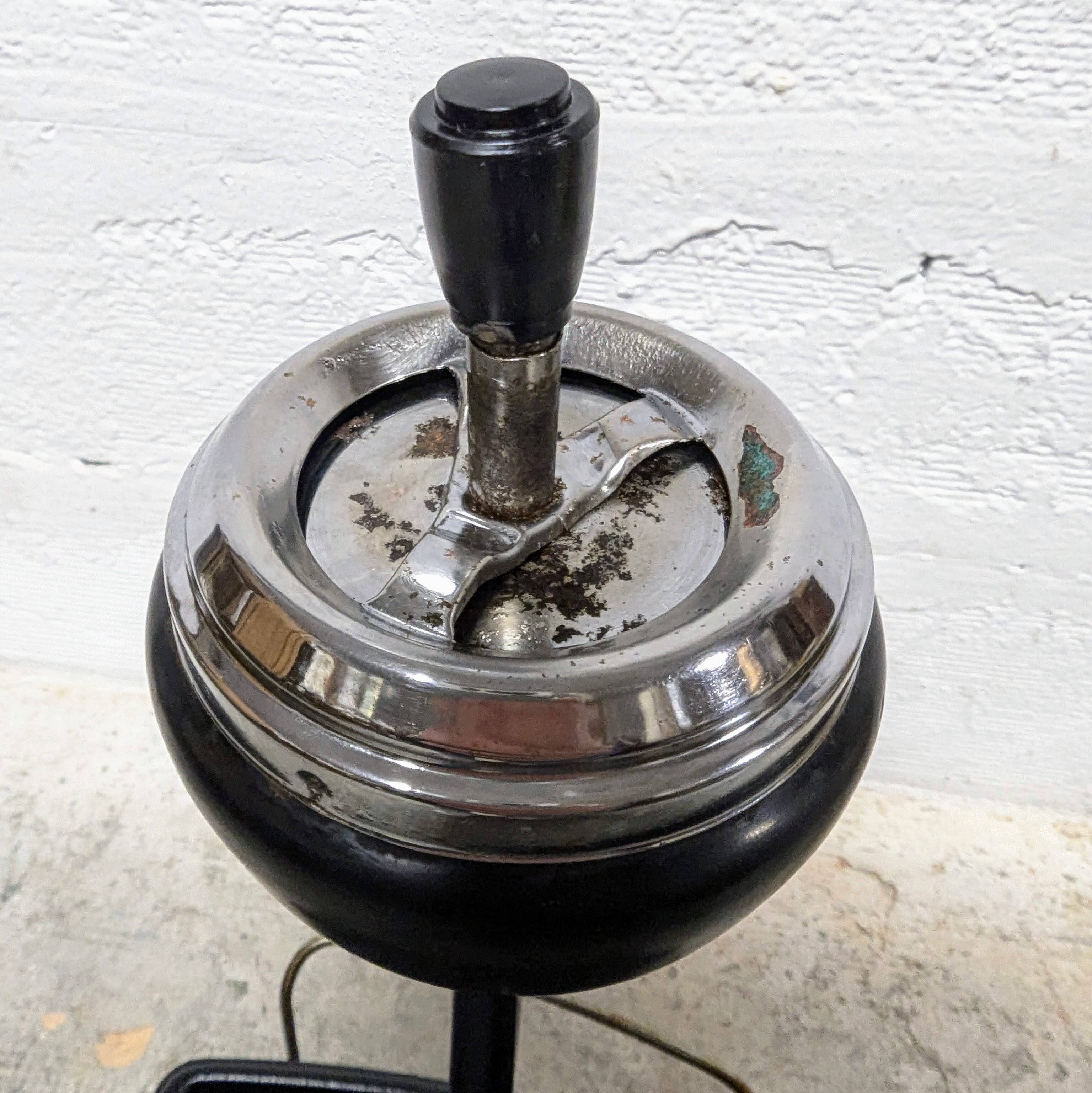 Standing ashtray with magazine rack